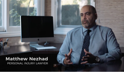 Matthew Nezhad talking with someone